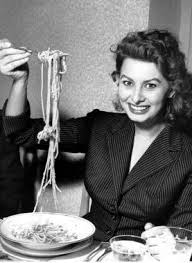 Woman eating pasta